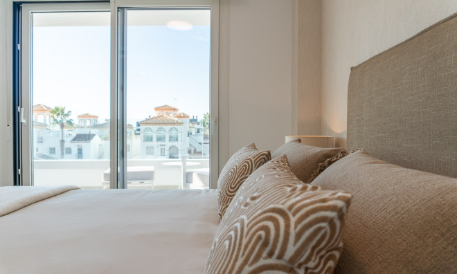 Obra nueva - Apartamento / piso -
Playa Flamenca