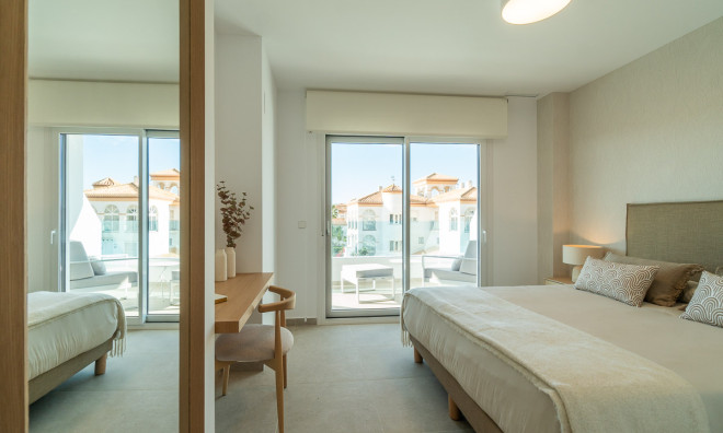 Obra nueva - Apartamento / piso -
Playa Flamenca